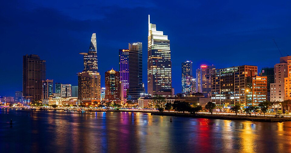 Ho Chi Minh City skyline beside the Saigon River at night